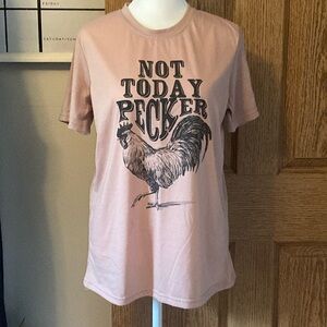 Boutique “pecker” tee.